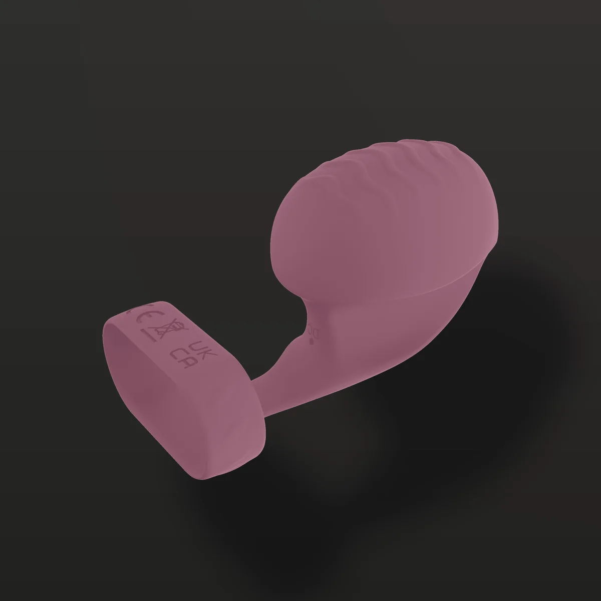 Vibrador de dedo LY030 deitado em ângulo: textura ondulada do bulbo e marcações na argola